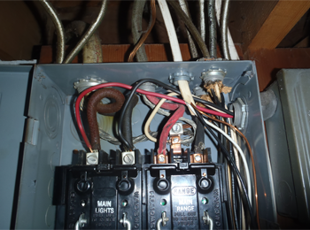 Unfortunately this is one that I see frequently.  Somebody needed another circuit but there panel was full.  A 30 amp line was tapped direclty onto the 60 amp main.  This is a safety hazard which could lead to a house fire.