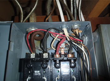 Unfortunately this is one that I see frequently. Somebody needed another circuit but there panel was full. A 30 amp line was tapped direclty onto the 60 amp main. This is a safety hazard which could lead to a house fire.